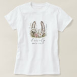 T-shirt Floral Cowgirl Bride Posse Floral Horseshoe<br><div class="desc">Round up your bride posse in style with this watercolor cowgirl boots tee—perfect for western-themed bachelorette weekends, rustic ranch getaways, or country-chic celebrations. Featuring soft floral horseshoe, and a custom script name, it’s made for brides and their friends who bring the boots and the beauty. Coordinate the crew and make...</div>