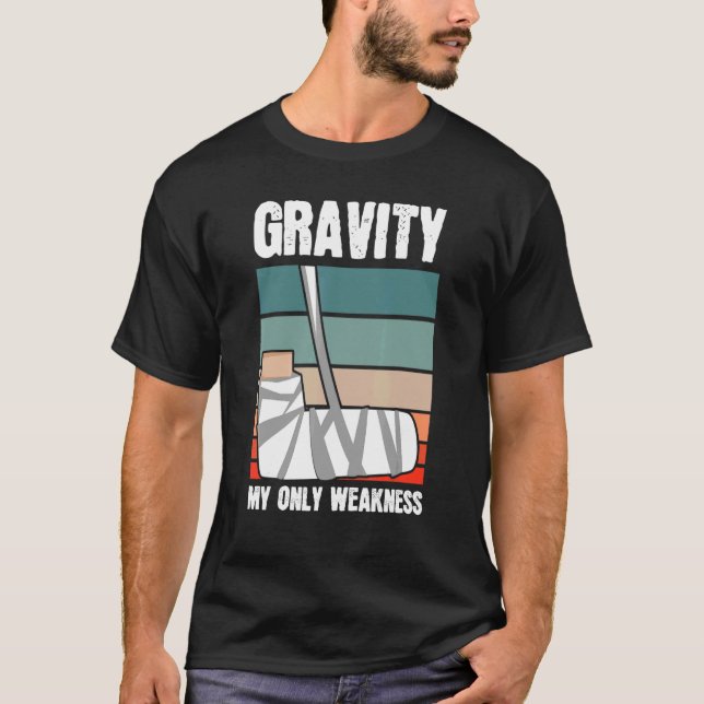 T-shirt Gravité Mon unique faible visage coude bras main p (Devant)