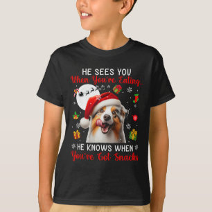 T-shirt Il voit quand vous mangez des collations Noël Aust