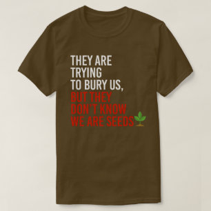 T-shirt Ils tentent de nous enterrer, mais nous sommes des