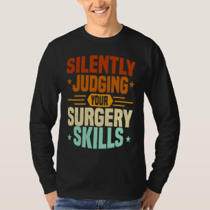 T-shirt Infirmière en anesthésie jugeant les compétences e