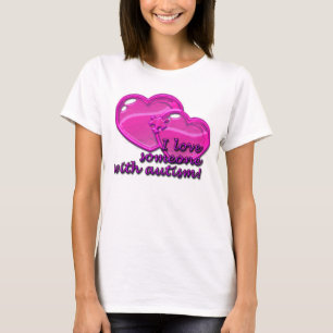 T-shirt J'aime quelqu'un avec la chemise d'autisme