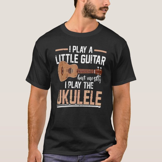 T-shirt Je Joue Une Petite Guitare Mais Surtout Je Joue À  (Devant)