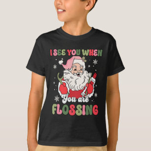 T-shirt Je te vois quand tu passes le fil dentaire Noël De