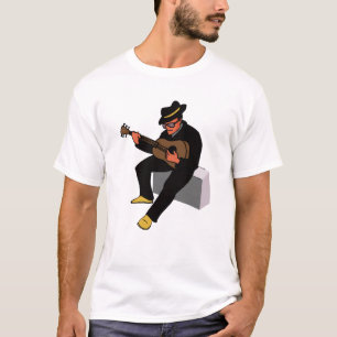 T-shirt joueur de guitare s'asseyant sur les bleus