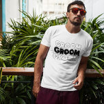 T-shirt Le GROOM (nom)<br><div class="desc">Le marié va adorer ce t-shirt alors qu'il se prépare pour son grand jour. Le texte dit le GROOM. Le même texte et la même couleur se répètent sur le dos de ce t-shirt. Le texte est une image qui permet de modifier la couleur à n'importe quel choix.</div>
