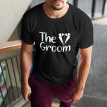 T-shirt Le GROOM (nom)<br><div class="desc">Le marié va adorer ce t-shirt alors qu'il se prépare pour son grand jour. Le texte dit le GROOM. Le même texte et la même couleur se répètent sur le dos de ce t-shirt. Le texte est une image qui permet de modifier la couleur à n'importe quel choix.</div>