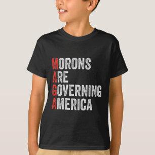 T-shirt Les Morons dirigent l'Amérique contre Trump