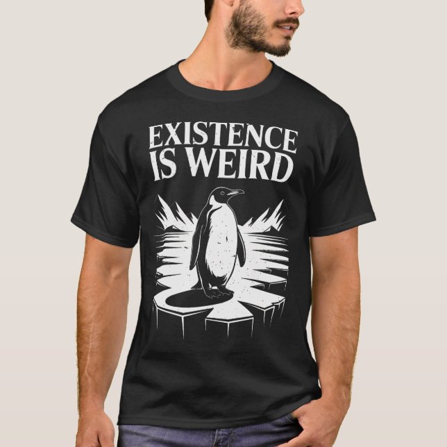 T-shirt L'existence est un pingouin bizarre qui se dirige  (Devant)