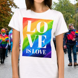 T-shirt Lgbt L'Amour Gay pride Est Amour<br><div class="desc">Ce T-shirt Gay pride est décoré avec LOVE IS LOVE en caractères blancs gras sur un arc-en-ciel d'aquarelle arrière - plan de rouge,  orange,  jaune,  vert,  bleu et violet. Aquarelle originale © Michele Davies.</div>