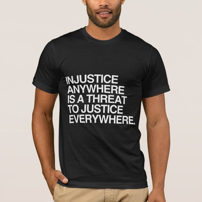 T-SHIRT L'INJUSTICE N'IMPORTE OÙ EST UNE MENACE POUR LA (Devant)