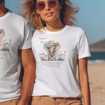 T-shirt Little Cowboy Boho Elephant Baby Faire-part<br><div class="desc">Chemise de boeuf mignonne avec un bébé éléphant dans un casquette de cowboy et beaucoup de fleurs sauvages en terre. Le tee est écrit avec "Saddle Up! Un petit cowboy est en route" dans la typographie occidentale et une palette de couleurs bleu et marron doux. Veuillez consulter ma collection de...</div>