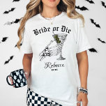 T-shirt Mariée Ou Mort Jusqu'À La Mort Faisons-Nous La Bac<br><div class="desc">Préparez-vous à tourner la tête à votre fête de bachelorette avec le T-shirt Mariée ou mort Do We Party Bachelorette. Doté d'une main squelette saisissante tenant un martini, cette chemise incarne parfaitement l'atmosphère ludique mais pointue d'un mariage gothique ou d'une fête sur le thème de l'Halloween. C’est le mélange ultime...</div>