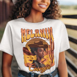 T-shirt MELANIN COWGIRL Black Girl Western Cowboy<br><div class="desc">Elégante chemise MELANIN COWGIRL Black Girl Western Cowboy T-Shirt avec TEXTE PERSONNALISABLE EN OPTION. Le design montre une femme noire en stetson de cowboy avec une scène de désert occidental, avec chemin de terre, coucher de soleil et cactus dans l'arrière - plan. La typographie en gras lit MELANIN COWGIRL et...</div>