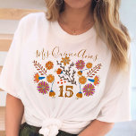 T-shirt Mis Quince Anos Floral Mexicain Occident Anniversa<br><div class="desc">T-shirt à fleurs mexicaines 15e anniversaire avec fleurs d'art populaire fiesta dans la palette de couleurs terreuses de champagne beige brun bleu rose orange et jaune. Design distinctif avec typographie occidentale et élégant script manuscrit. Le modèle est configuré pour changer l'occasion et le numéro d'anniversaire, si vous le souhaitez. Veuillez...</div>