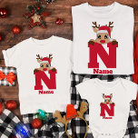 T-shirt Monogramme de Noël Personnalisé Avec Le Nom Funny<br><div class="desc">Voici notre Monogramme de Noël Personnalisé Avec Nom Funny Pyjama T-Shirt blanc - l'ajout parfait à vos célébrations familiales festives! Élevez votre esprit de vacances avec ces chemises personnalisées conçues pour apporter joie et unité à vos réunions de famille. Dotés d'un charmant monogramme avec des noms personnalisés, ces chemises ajoutent...</div>
