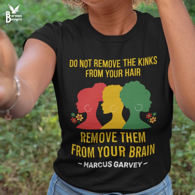 T-shirt NE RETIREZ PAS LES ROCHERS DE VOTRE GARvey CHEVEUX (Black tee with red, yellow, green silhouettes of afro hairstyles and Marcus Garvey quote in yellow)