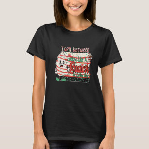 T-shirt Noël déchiré entre avoir l'air d'un encas ou mange