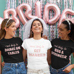 T-shirt Parti De Bachelorette Les Plus Susceptibles D'Être<br><div class="desc">Apportez une touche d'anticipation ludique aux festivités de la bachelorette avec ce design charmant et personnalisable de t-shirt! Avec l'expression parfaitement appropriée "très susceptible de se marier" en lettres roses délicates contre un arrière - plan blanc et croustillant, ce design est à la fois sucré et salé. C'est un choix...</div>