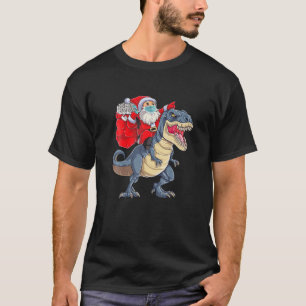 T-shirt Père Noël à cheval sur un dinosaure T Rex Noël Pèr