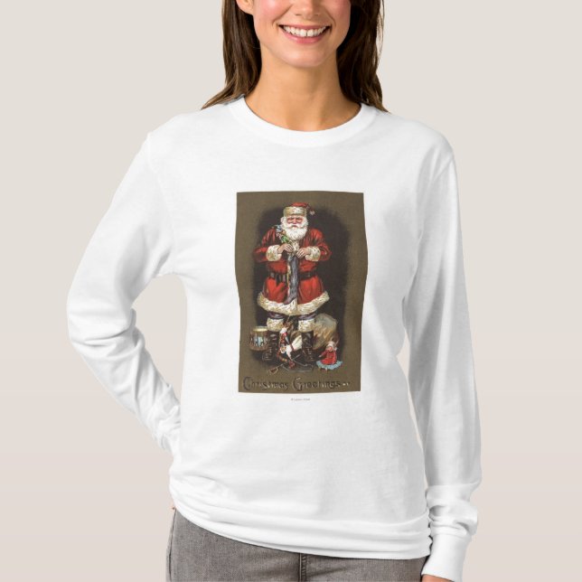 T-shirt Père Noël bourrant le bas avec le casse-noix (Devant)