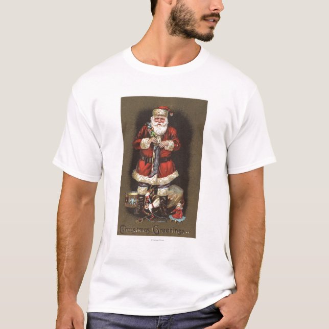 T-shirt Père Noël bourrant le bas avec le casse-noix (Devant)