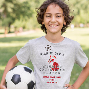 T-shirt Père Noël de football donnant le coup d'envoi d'un