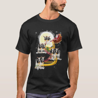 T-shirt Père Noël de Noël à cheval sur une vache laitière
