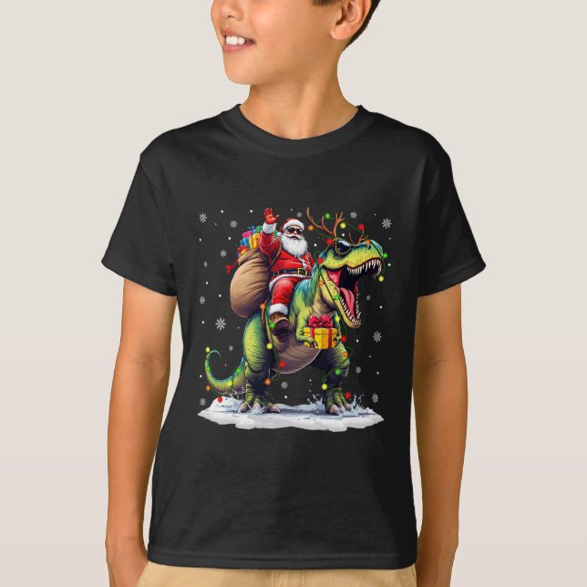 T-shirt Père Noël équitation Dinosaur T Rex Christmas Boys (Devant)
