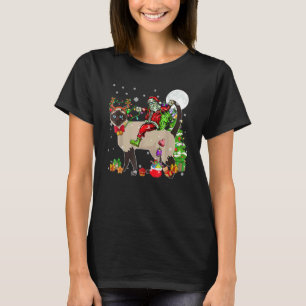 T-shirt Père Noël montant un chat siamois au pied de l'arb