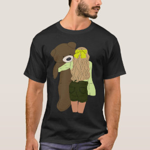 T-shirt petite fille portant peluche