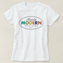 Pièce en t de logo d'AMQG