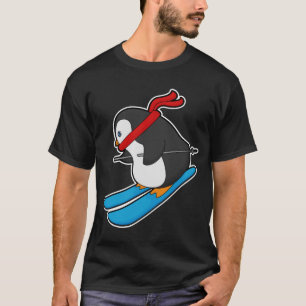 T-shirt Pingouin comme skieur avec ski