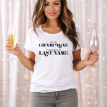 T-shirt "Pop the Champagne" - Mariée à être<br><div class="desc">Design tendance et chic de fête de mariée.</div>