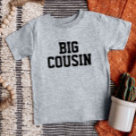 T-shirt Pour Bébé Big Cousin | Famille correspondante<br><div class="desc">Vêtements imprimés personnalisés avec le graphisme "Big Cousin" ou tout autre texte personnalisé. Utilisez les outils de conception pour modifier les polices de texte et les couleurs ou ajouter vos propres photos pour créer un modèle de t-shirt personnalisé. Faites votre choix parmi une grande variété de t-shirts, de débardeurs et...</div>