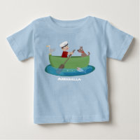 Garçon marin mignon et chien faisant du bateau à r