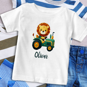 T-shirt Pour Bébé Joli lionceau sur un charmant tracteur vert