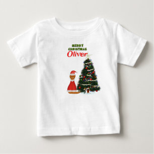 T-shirt Pour Bébé Oliver déguisé en Père Noël près de son arbre de N