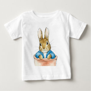 T-shirt Pour Bébé Pierre le lapin assis dans un pot