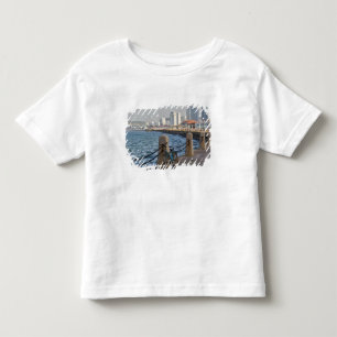 T-shirt Pour Les Tous Petits Bicyclette au bord de l'eau avec la skyline de la