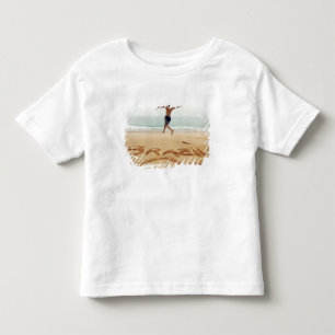 T-shirt Pour Les Tous Petits BRÉSIL. Homme torse nu portant un maillot de bain