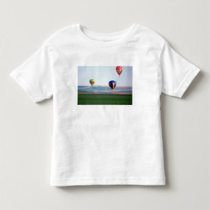 T-shirt Pour Les Tous Petits Des montgolfières colorées flottent au-dessus du