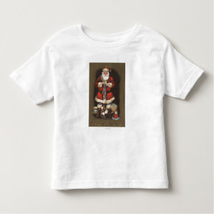 T-shirt Pour Les Tous Petits Père Noël bourrant le bas avec le casse-noix