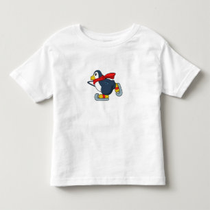 T-shirt Pour Les Tous Petits Pingouin au patinage sur glace avec patins sur gla