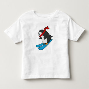 T-shirt Pour Les Tous Petits Pingouin comme skieur avec ski