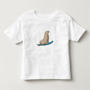 T-shirt Pour Les Tous Petits Sceau comme surfeur avec Surfboard