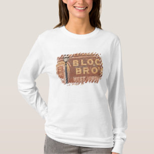 T-shirt Publicités sur le côté d'un bâtiment
