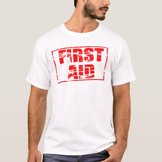 T-shirt Red rubber stamp effect. First Aid.  (Devant)
