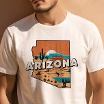 T-shirt Retro Voyage Iconic Arizona Graphic<br><div class="desc">Montrez l'esprit dynamique de l'État du Grand Canyon avec ce T-Shirt Retro Travel Iconic Arizona Graphic. Doté d'un design d'inspiration vintage qui saisit le charme unique et les paysages magnifiques de l'Arizona, ce T-shirt est parfait pour les voyageurs comme pour les résidents. Fabriqué avec des matériaux de haute qualité pour...</div>