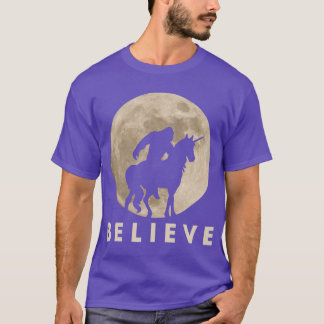 T-shirt Riding a Unicorn Against a Full Moon